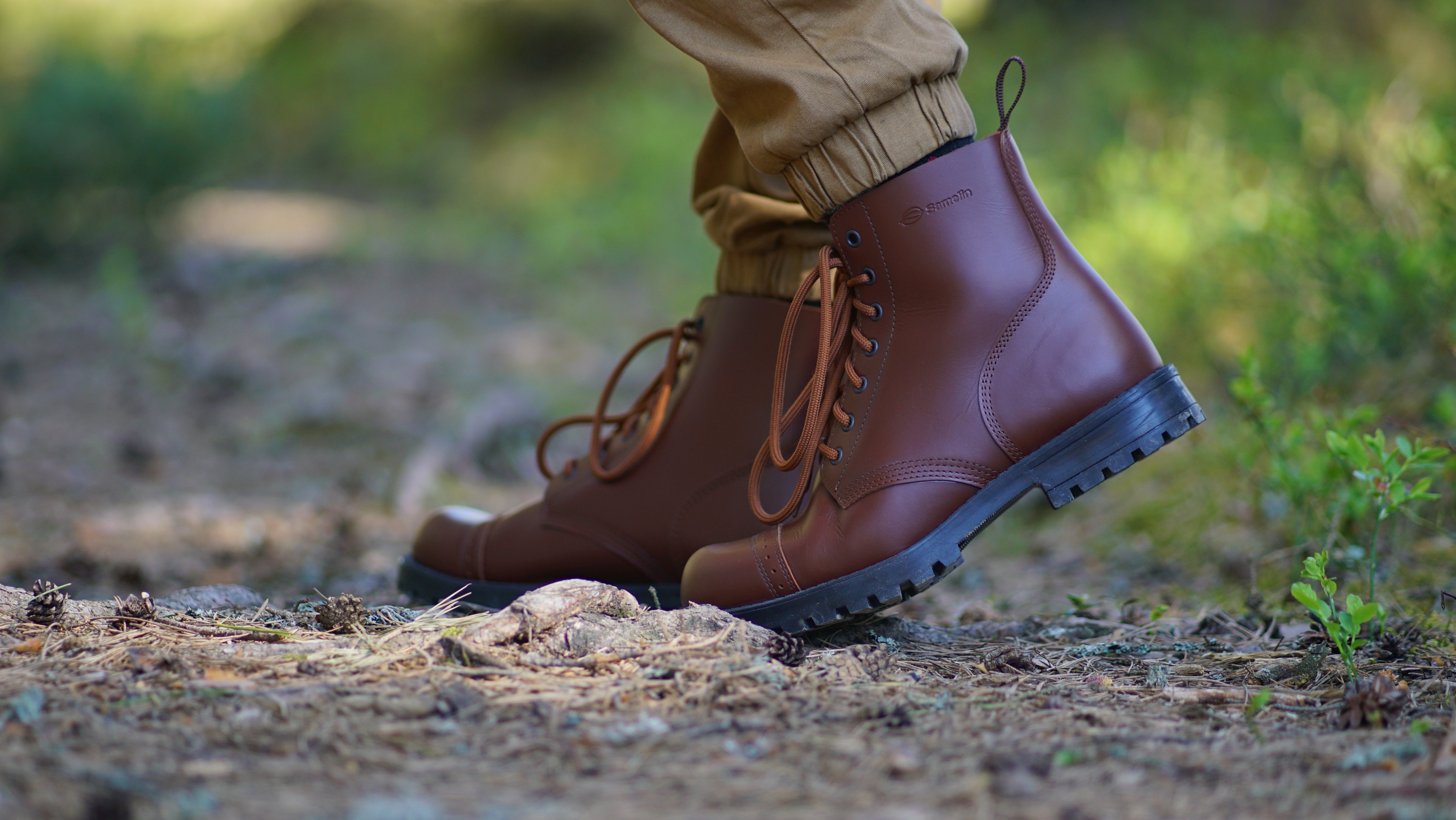 Brown Samelin 517 Aviator boots on a forest path