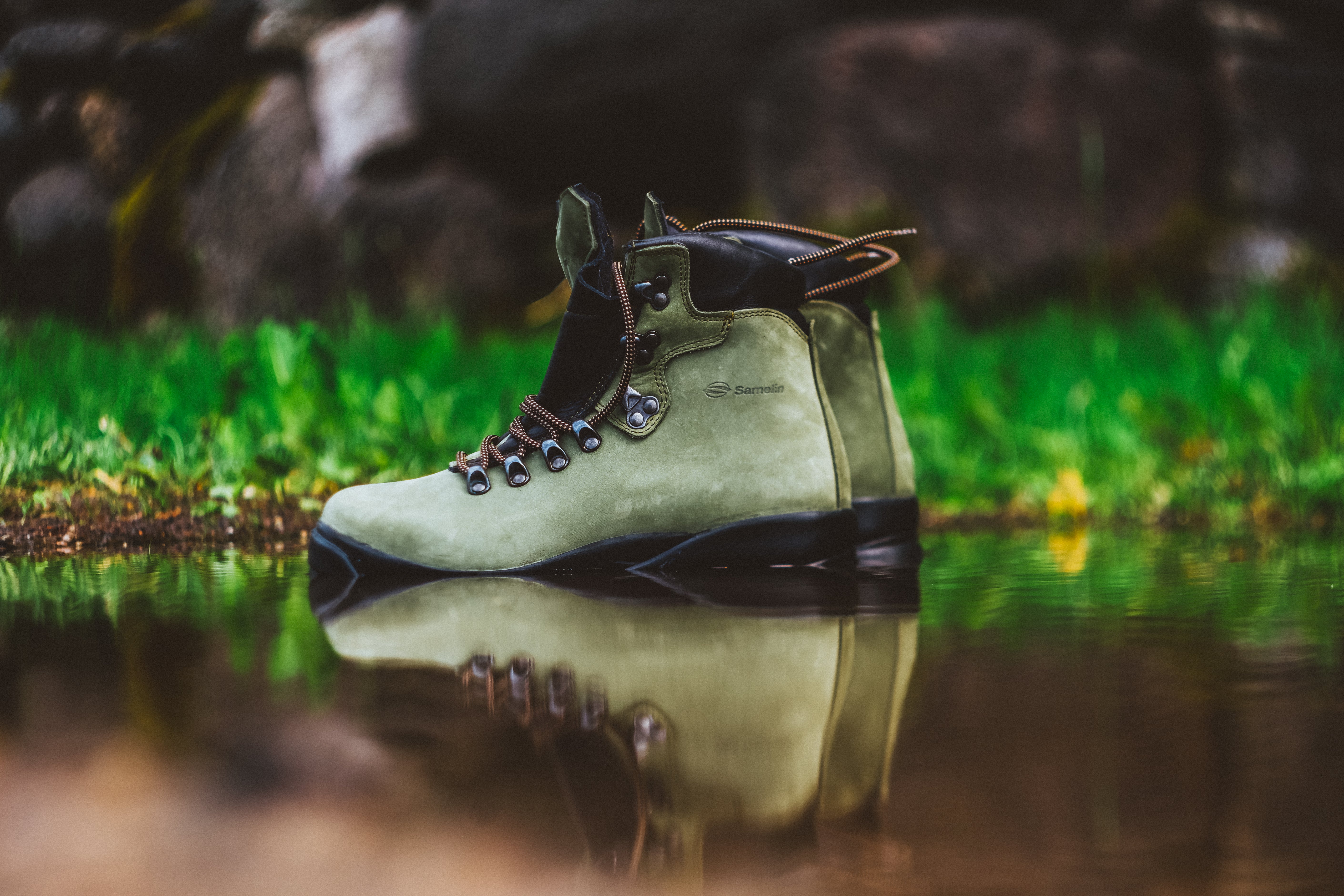 Green Samelin hiking boots by the water